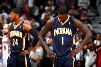 ATLANTA, GA - APRIL 24:  Lance Stephenson #1 and Paul George #24 of the Indiana Pacers react in the final minutes of their 98-85 loss to the Atlanta Hawks in Game 3 of the Eastern Conference Quarterfinals during the 2014 NBA Playoffs at Philips Arena on A