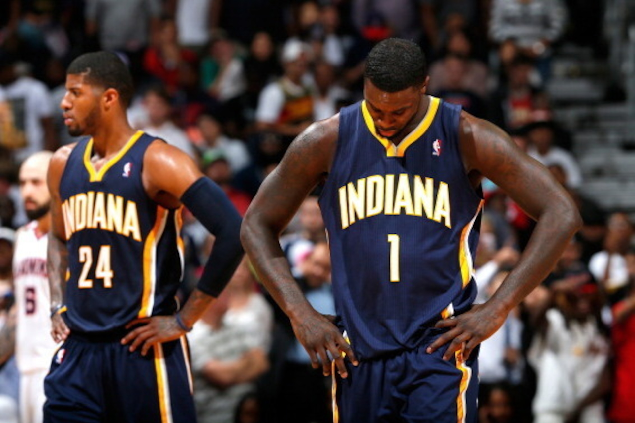 ATLANTA, GA - APRIL 24:  Lance Stephenson #1 and Paul George #24 of the Indiana Pacers react in the final minutes of their 98-85 loss to the Atlanta Hawks in Game 3 of the Eastern Conference Quarterfinals during the 2014 NBA Playoffs at Philips Arena on A
