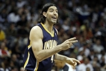 Apr 24, 2014; Atlanta, GA, USA; Indiana Pacers forward Luis Scola (4) talks to a teammate against the Atlanta Hawks in the second quarter in game three of the first round of the 2014 NBA Playoffs at Philips Arena. Mandatory Credit: Brett Davis-USA TODAY S