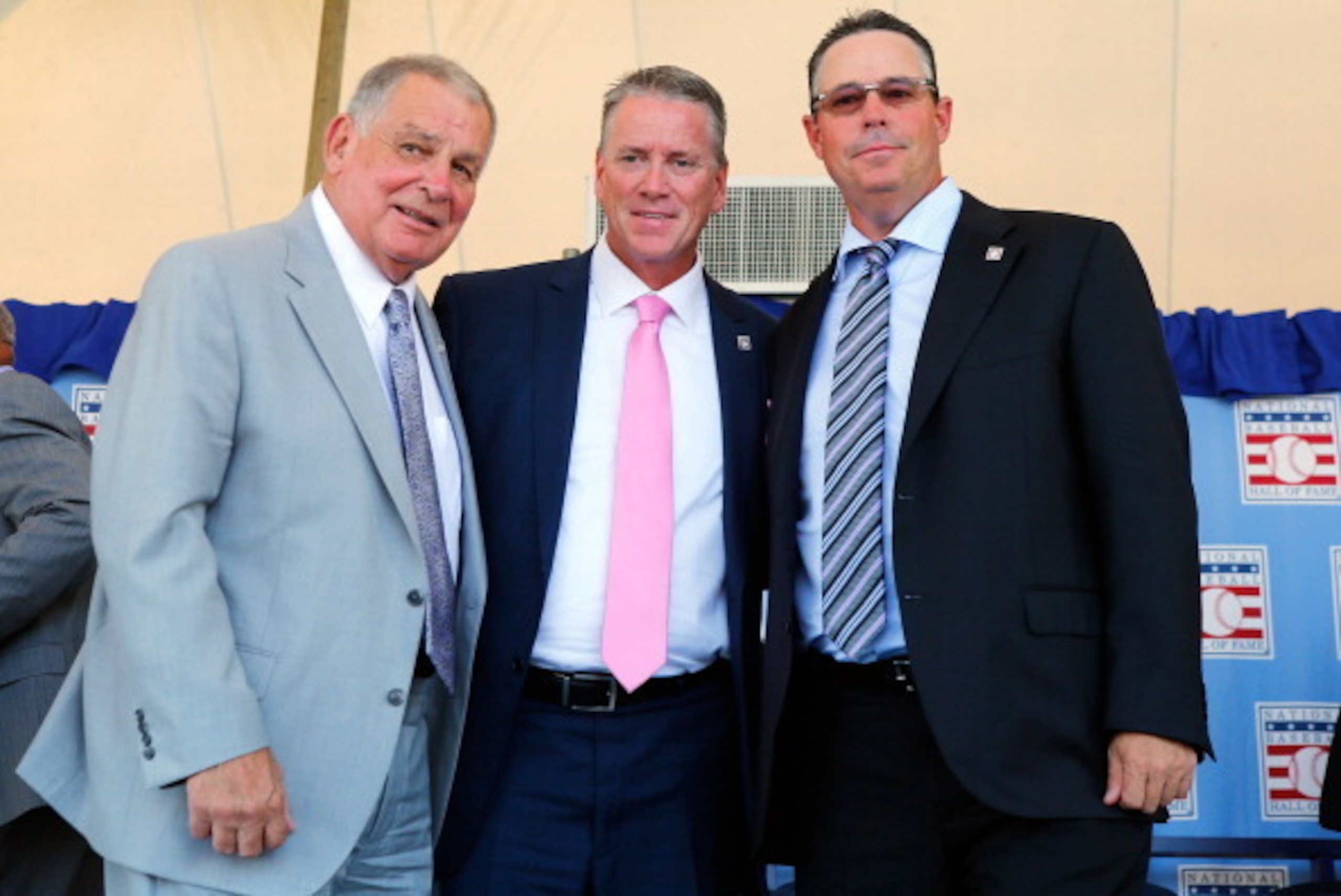 COOPERSTOWN, NY - JULY 27:  (L-R) Inductees Bobby Cox, Tom Glavine and Greg Maddux pose for a photograph at Clark Sports Center during the Baseball Hall of Fame induction ceremony on July 27, 2014 in Cooperstown, New York.  Glavine won 305 games and two N