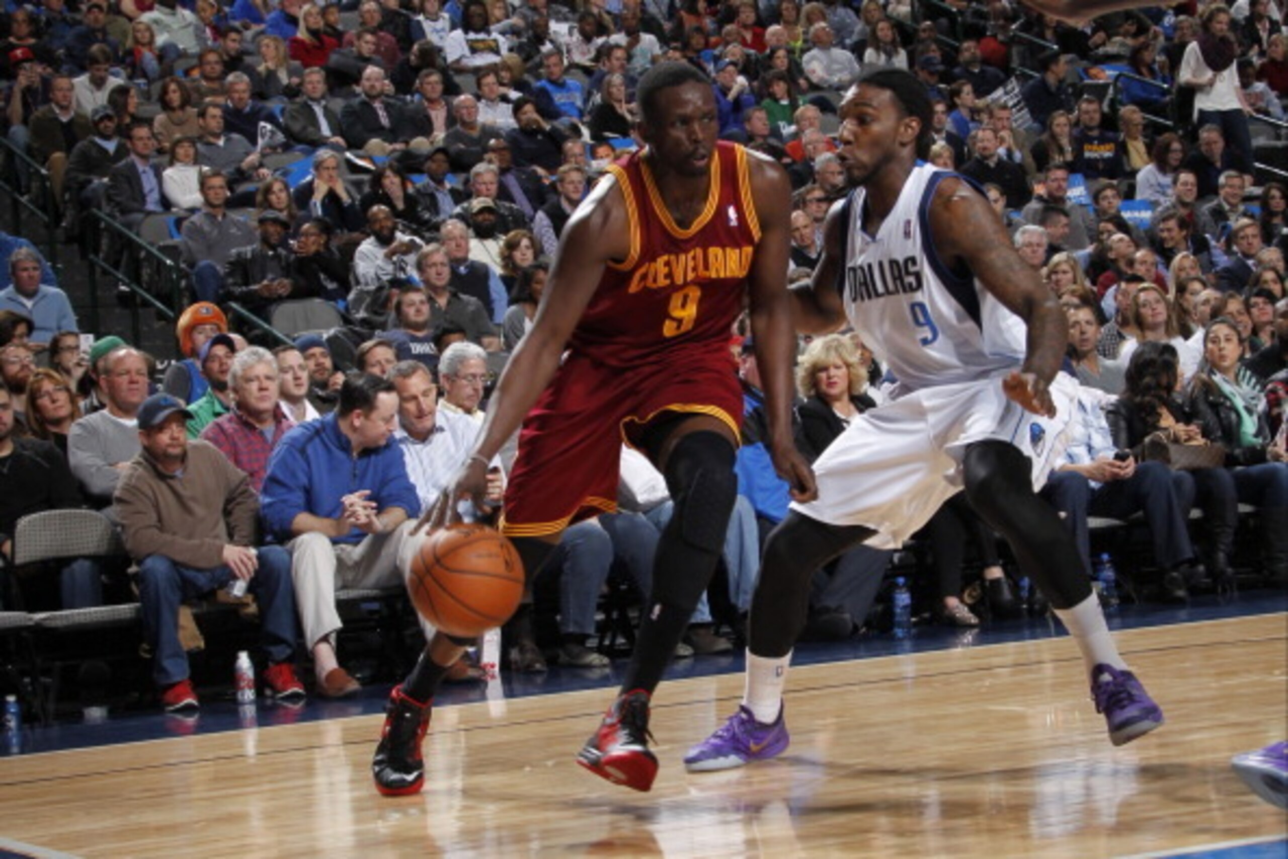 DALLAS, TX - FEBRUARY 3: Luol Deng #9 of the Cleveland Cavaliers handling the ball during a game against the Dallas Mavericks on February 3, 2014 at the American Airlines Center in Dallas, Texas. NOTE TO USER: User expressly acknowledges and agrees that, 