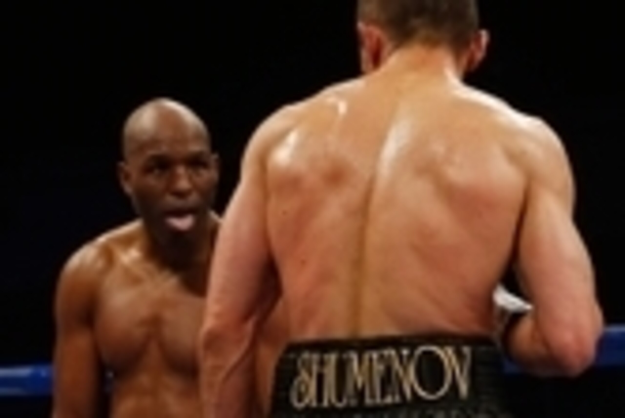 Apr 19, 2014; Washington, DC, USA; Bernard Hopkins  (red gloves) sticks his tongue out at Beibut Shumenov (black gloves) during their bout at DC Armory. Mandatory Credit: Geoff Burke-USA TODAY Sports