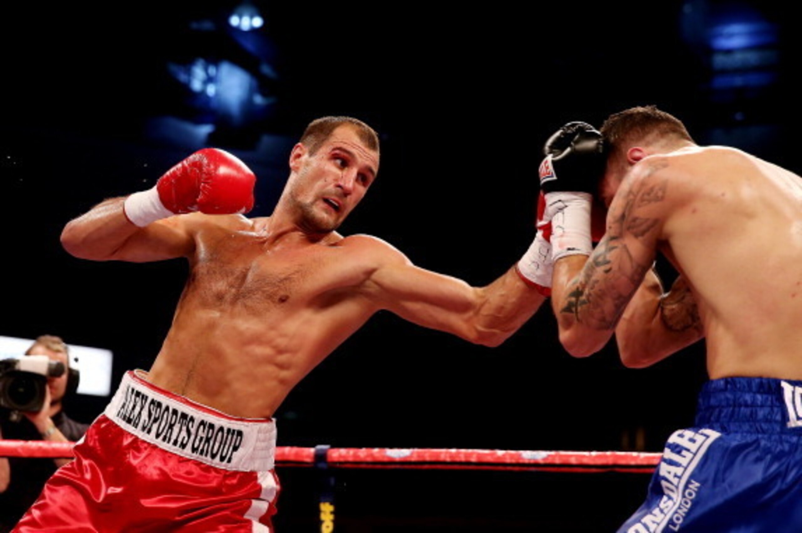 CARDIFF, WALES - AUGUST 17:  Nathan Cleverly (R) in action against Sergey Kovalev during the WBO World Light-Heavyweight Championship bout at Motorpoint Arena on August 17, 2013 in Cardiff, Wales.  (Photo by Scott Heavey/Getty Images)