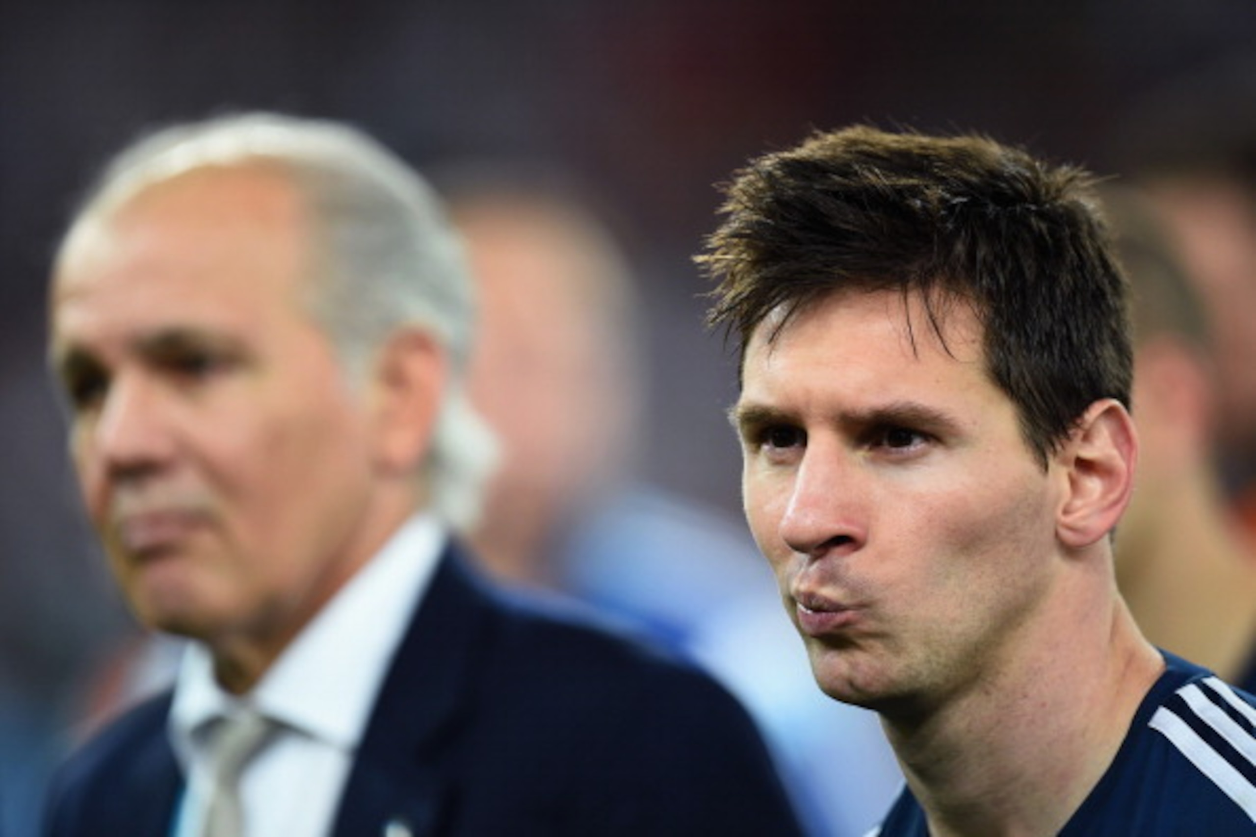 RIO DE JANEIRO, BRAZIL - JULY 13:  Lionel Messi of Argentina looks on  after being defeated by Germany 1-0 during the 2014 FIFA World Cup Brazil Final match between Germany and Argentina at Maracana on July 13, 2014 in Rio de Janeiro, Brazil.  (Photo by J