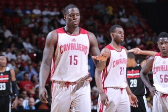 LAS VEGAS, NV - JULY 17: Anthony Bennett #15 of the Cleveland Cavaliers high fives a teammate against the Houston Rockets at the Samsung NBA Summer League 2014 on July 17, 2014 at the Thomas & Mack Center in Las Vegas, Nevada. NOTE TO USER: User expressly