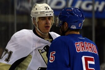 NEW YORK, NY - MAY 11:  Evgeni Malkin #71 of the Pittsburgh Penguins and Dan Girardi #5 of the New York Rangers exchange words during Game Six of the Second Round of the 2014 NHL Stanley Cup Playoffs at Madison Square Garden on May 11, 2014 in New York Ci