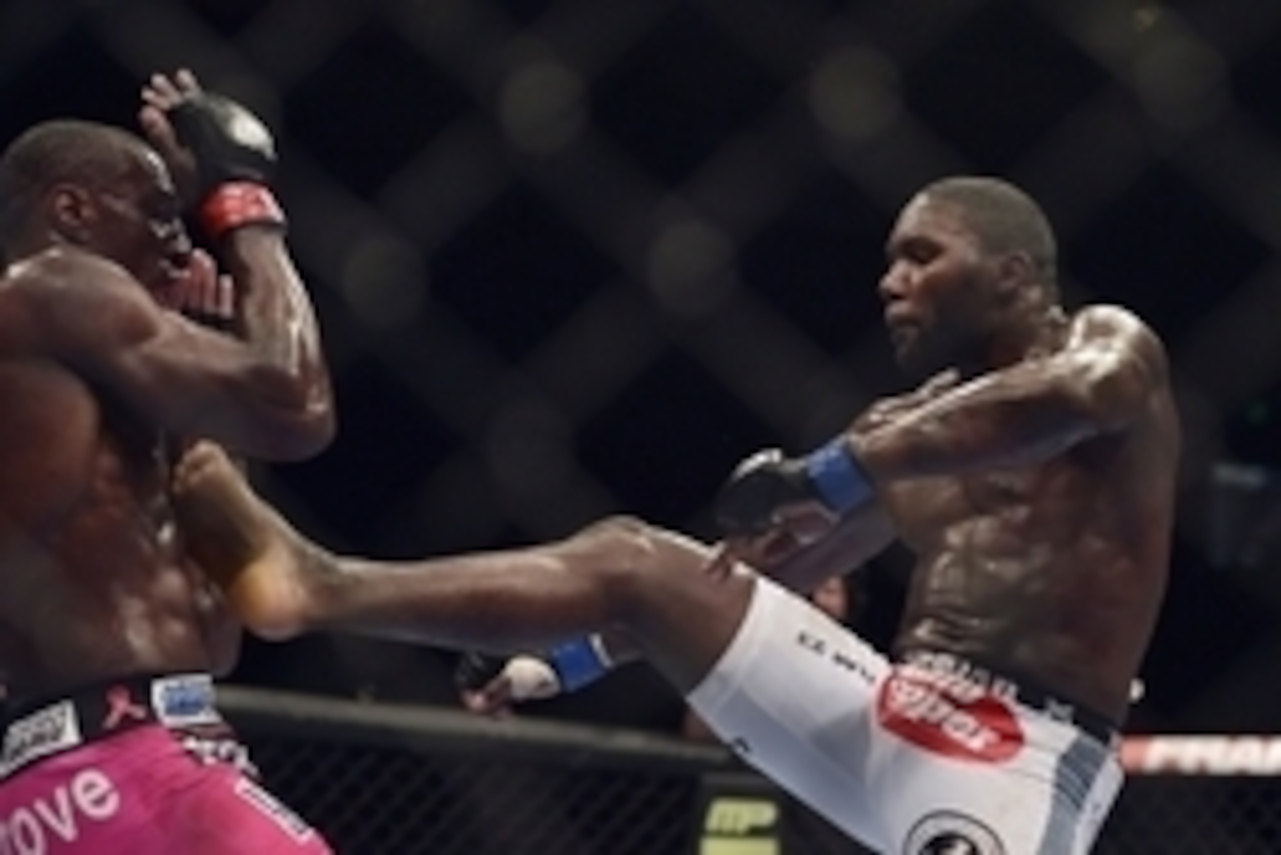 Apr 26, 2014; Baltimore, MD, USA;   Anthony Johnson (blue gloves) fights Phil Davis (red gloves) during UFC 172 at Baltimore Arena.  Mandatory Credit: Tommy Gilligan-USA TODAY Sports