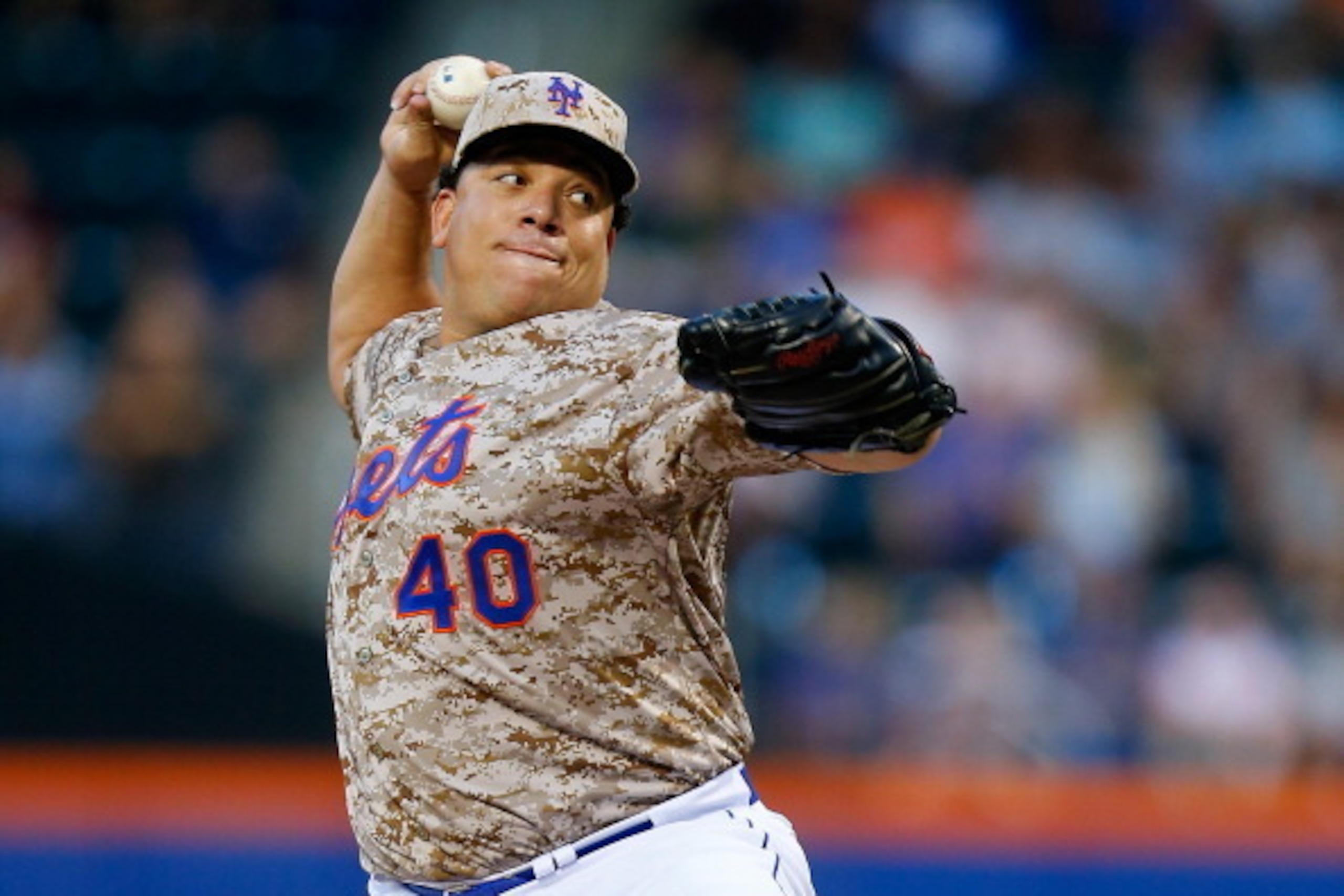 NEW YORK, NY - JULY 28:  Bartolo Colon #40 of the New York Mets picthes in the second inning against the Philadelphia Phillies on July 28, 2014 at Citi Field in the Flushing neighborhood of the Queens borough of New York City.  (Photo by Mike Stobe/Getty 