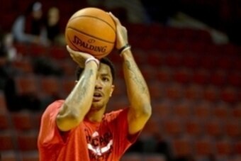 Feb 11, 2014; Chicago, IL, USA; Chicago Bulls point guard Derrick Rose (1) warms up before their game against the Atlanta Hawks at United Center. Mandatory Credit: Matt Marton-USA TODAY Sports
