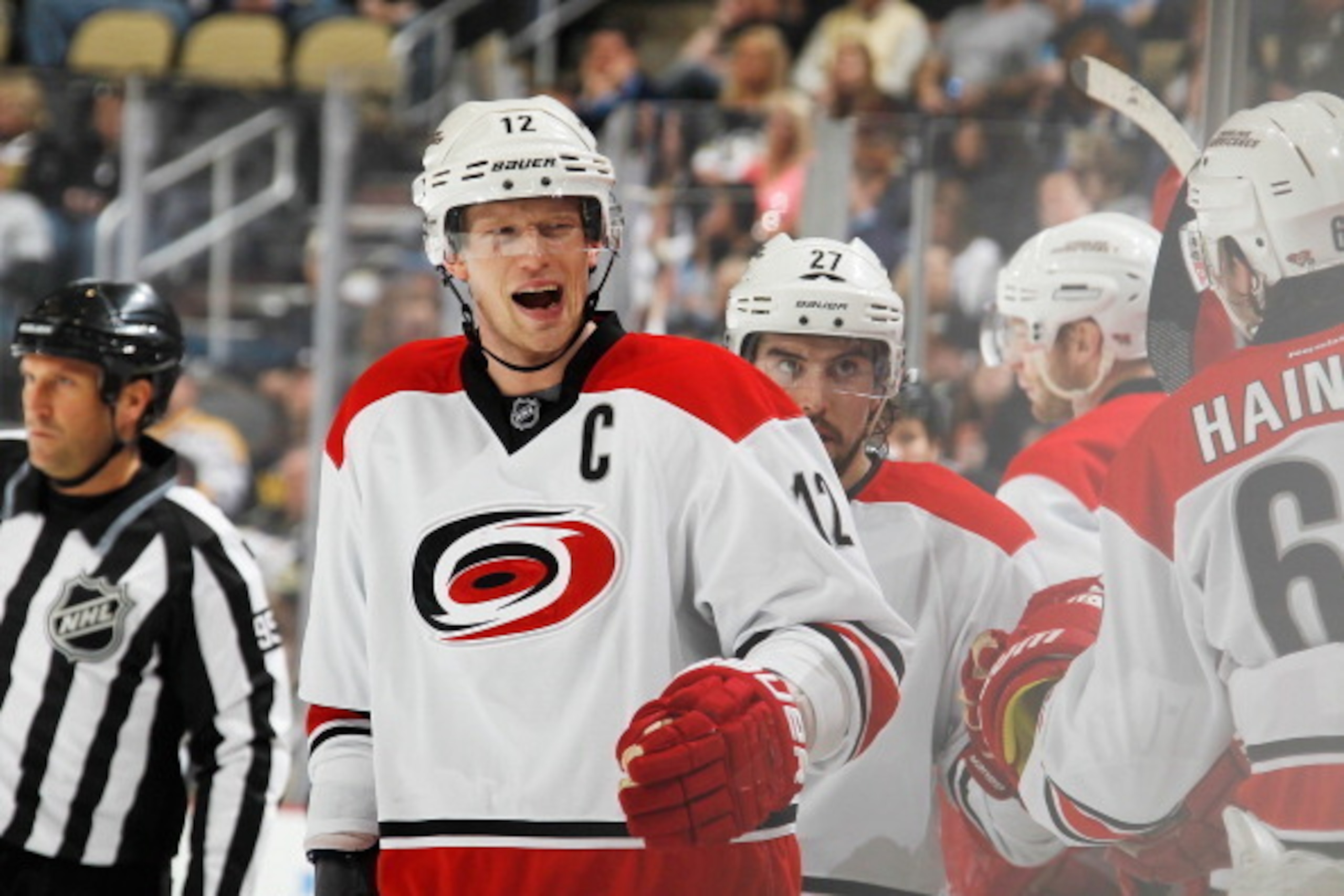 PITTSBURGH, PA - APRIL 1:  Eric Staal #12 of the Carolina Hurricanes celebrates his goal with the bench during the third period against the Pittsburgh Penguins on April 1, 2014 at Consol Energy Center in Pittsburgh, Pennsylvania.  (Photo by Gregory Shamus