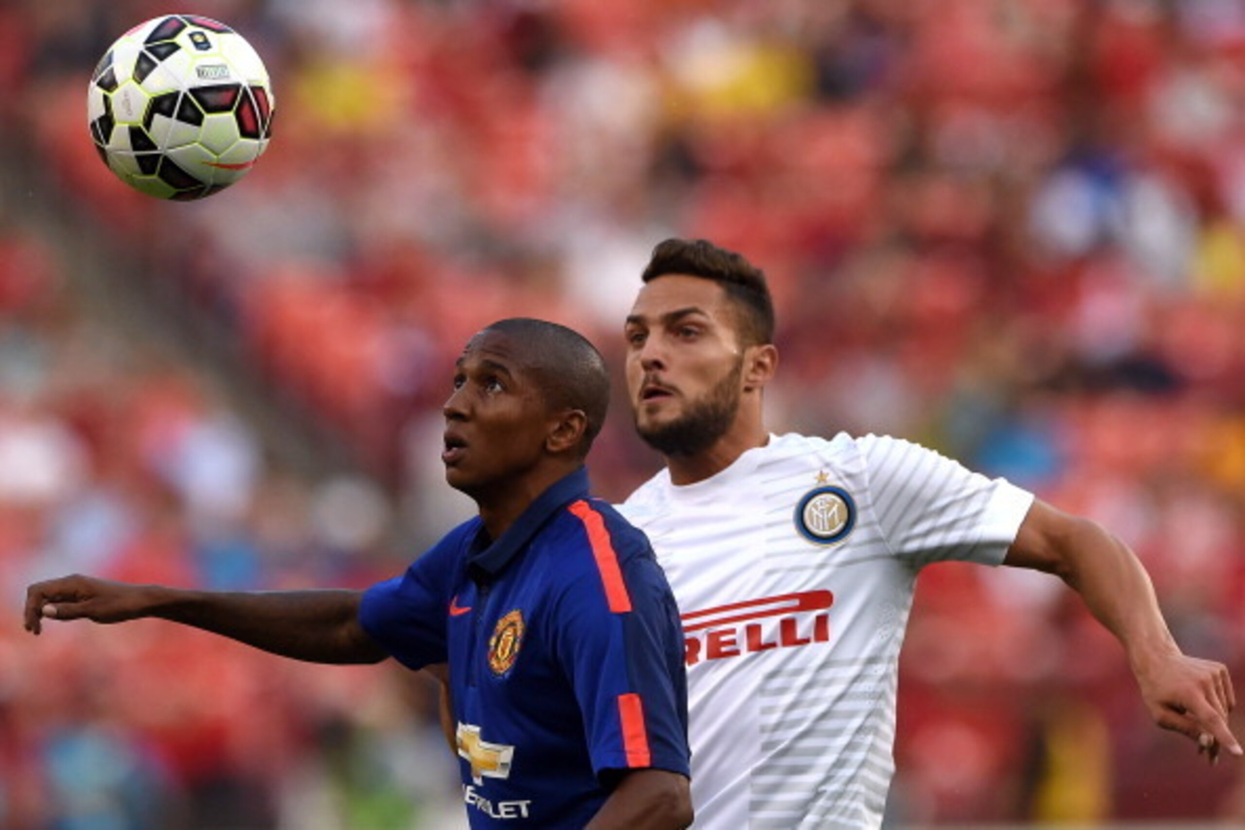 LANDOVER, MD - JULY 29: Ashley Young #18 of Manchester United (L) and Danilo D'Ambrosio #33 of Inter Milan battle for the ball in the first half during their match in the International Champions Cup 2014 at FedExField on July 29, 2014 in Landover, Marylan