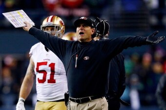 SEATTLE, WA - JANUARY 19: Head coach Jim Harbaugh of the San Francisco 49ers reacts during the 2014 NFC Championship against the Seattle Seahawks at CenturyLink Field on January 19, 2014 in Seattle, Washington.  (Photo by Tom Pennington/Getty Images)