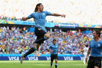 FORTALEZA, BRAZIL - JUNE 14:  Edinson Cavani of Uruguay celebrates scoring his team's first goal on a penalty kick during the 2014 FIFA World Cup Brazil Group D match between Uruguay and Costa Rica at Castelao on June 14, 2014 in Fortaleza, Brazil.  (Phot