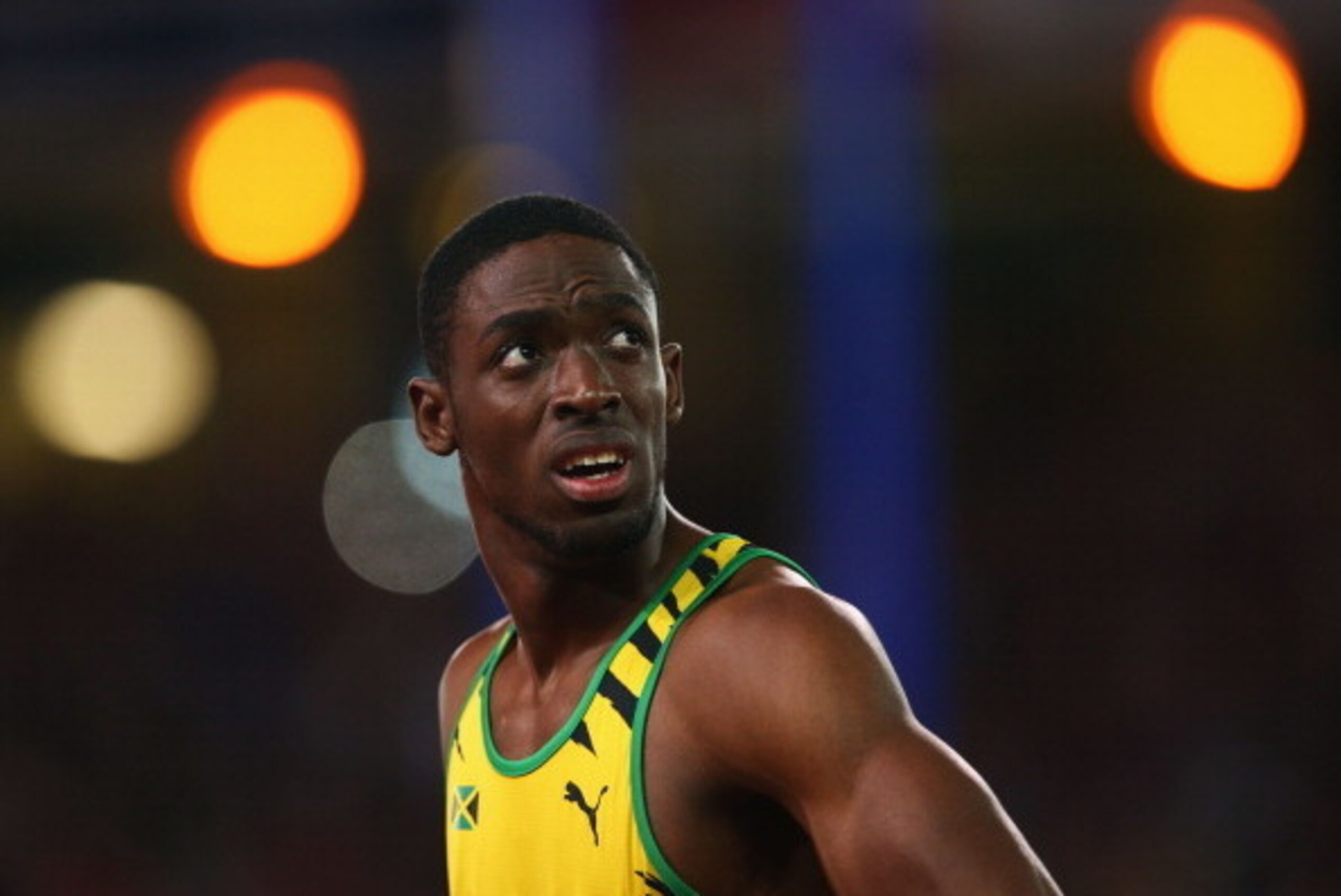 GLASGOW, SCOTLAND - JULY 28:  Gold medalist Kemar Bailey-Cole of Jamaica looks on after  the MenÂs 100 metres final at Hampden Park during day five of the Glasgow 2014 Commonwealth Games on July 28, 2014 in Glasgow, United Kingdom.  (Photo by Julian Finne