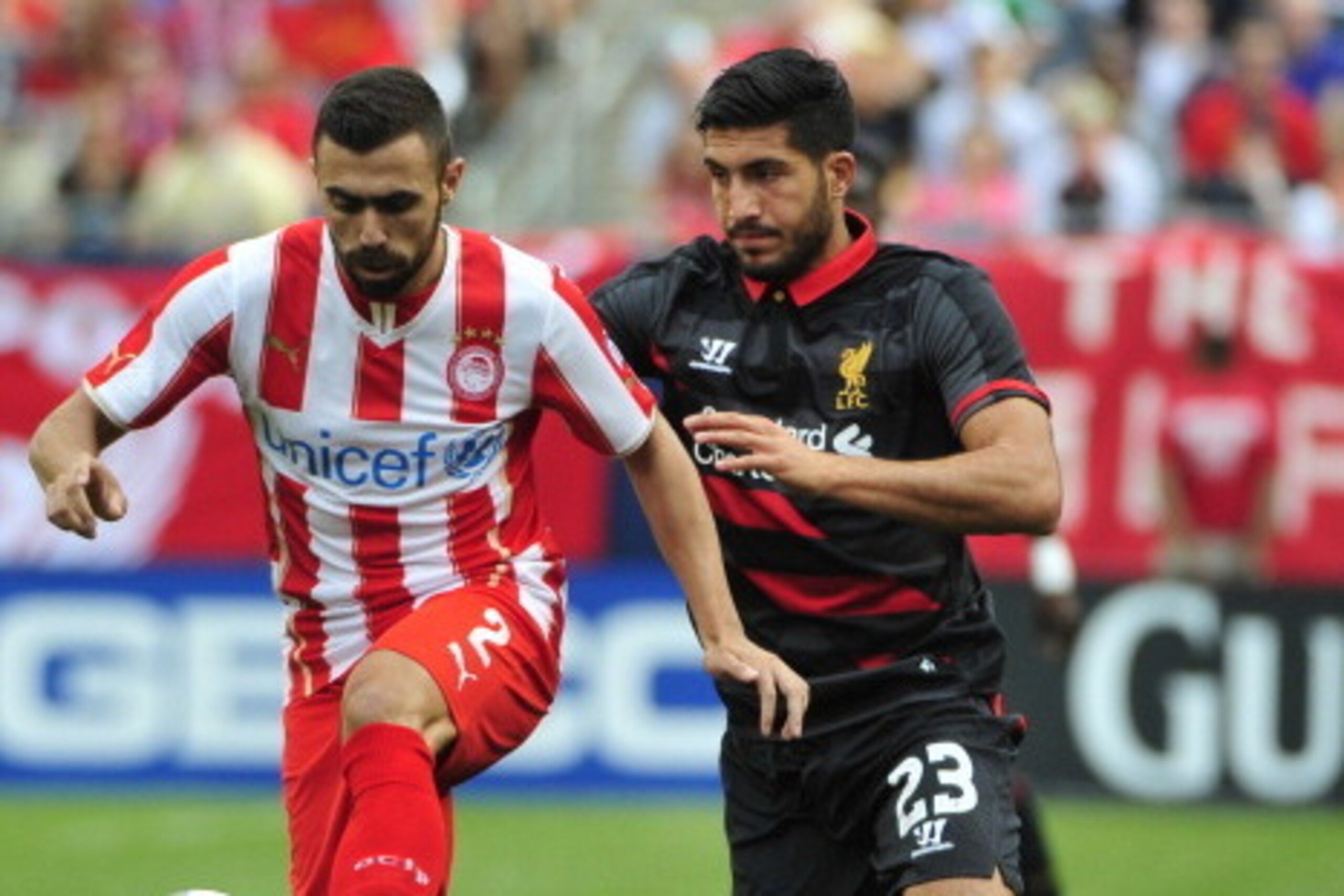 CHICAGO, IL - JULY 27: Ionnis Maniatis #2 of Olympiacos FC and Emre Can #23 of Liverpool go for the ball during the International Champions Cup 2014 on July 27, 2014 at Soldier Field in Chicago, Illinois.  (Photo by David Banks/Getty Images)