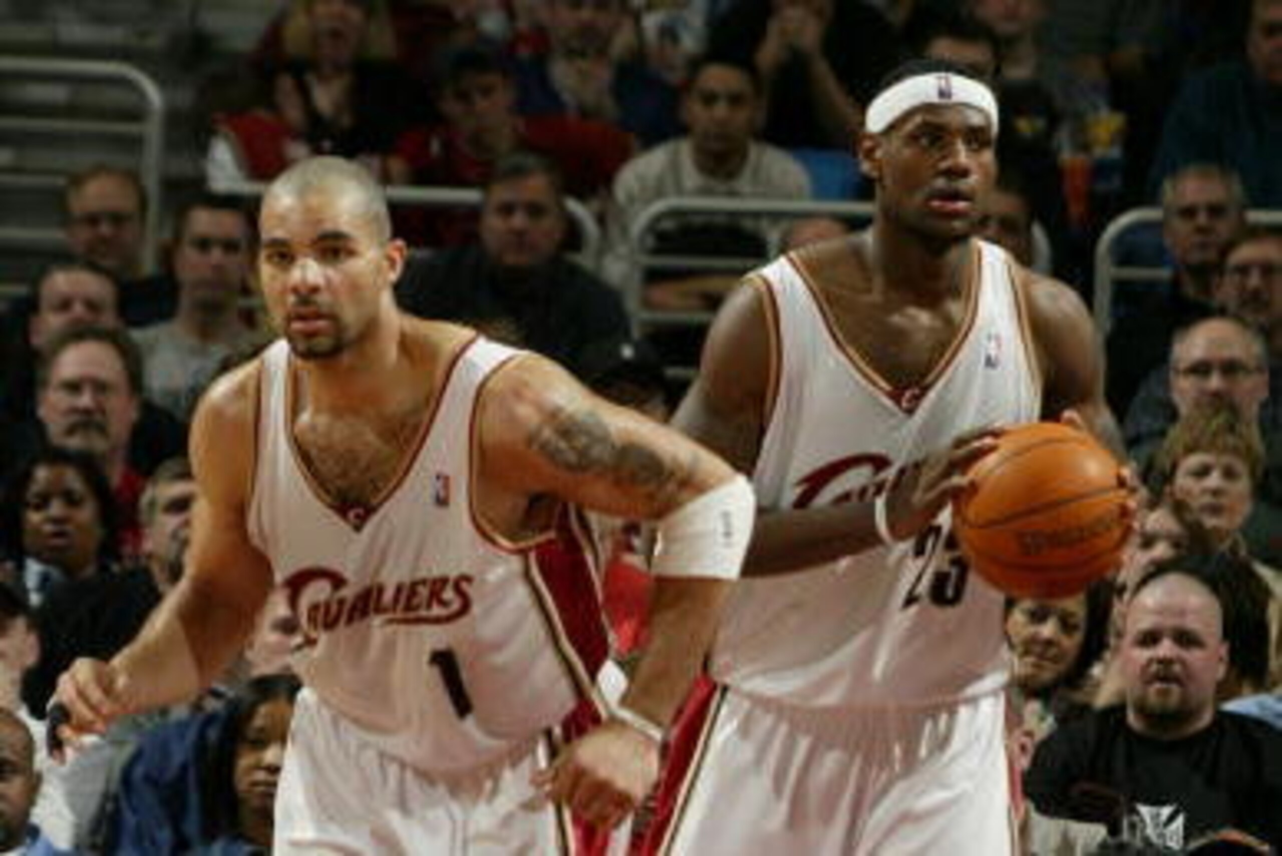 CLEVELAND - MARCH 6: LeBron James #23 and Carlos Boozer #1 of the Cleveland Cavaliers against the Milwaukee Bucks at Gund Arena on March 6, 2004 in Cleveland, Ohio. NOTE TO USER: User expressly acknowledges and agrees that, by downloading and or using t CLEVELAND - MARCH 6: LeBron James #23 and Carlos Boozer #1 of the Cleveland Cavaliers against the Milwaukee Bucks at Gund Arena on March 6, 2004 in Cleveland, Ohio. NOTE TO USER: User expressly acknowledges and agrees that, by downloading and or using t