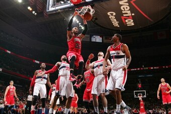 WASHINGTON, DC - APRIL 27: Taj Gibson #22 of the Chicago Bulls dunks against the Washington Wizards in Game Four of the Eastern Conference Quarterfinals during the 2014 NBA Playoffs at the Verizon Center on April 27, 2014 in Washington, DC. NOTE TO USER: 