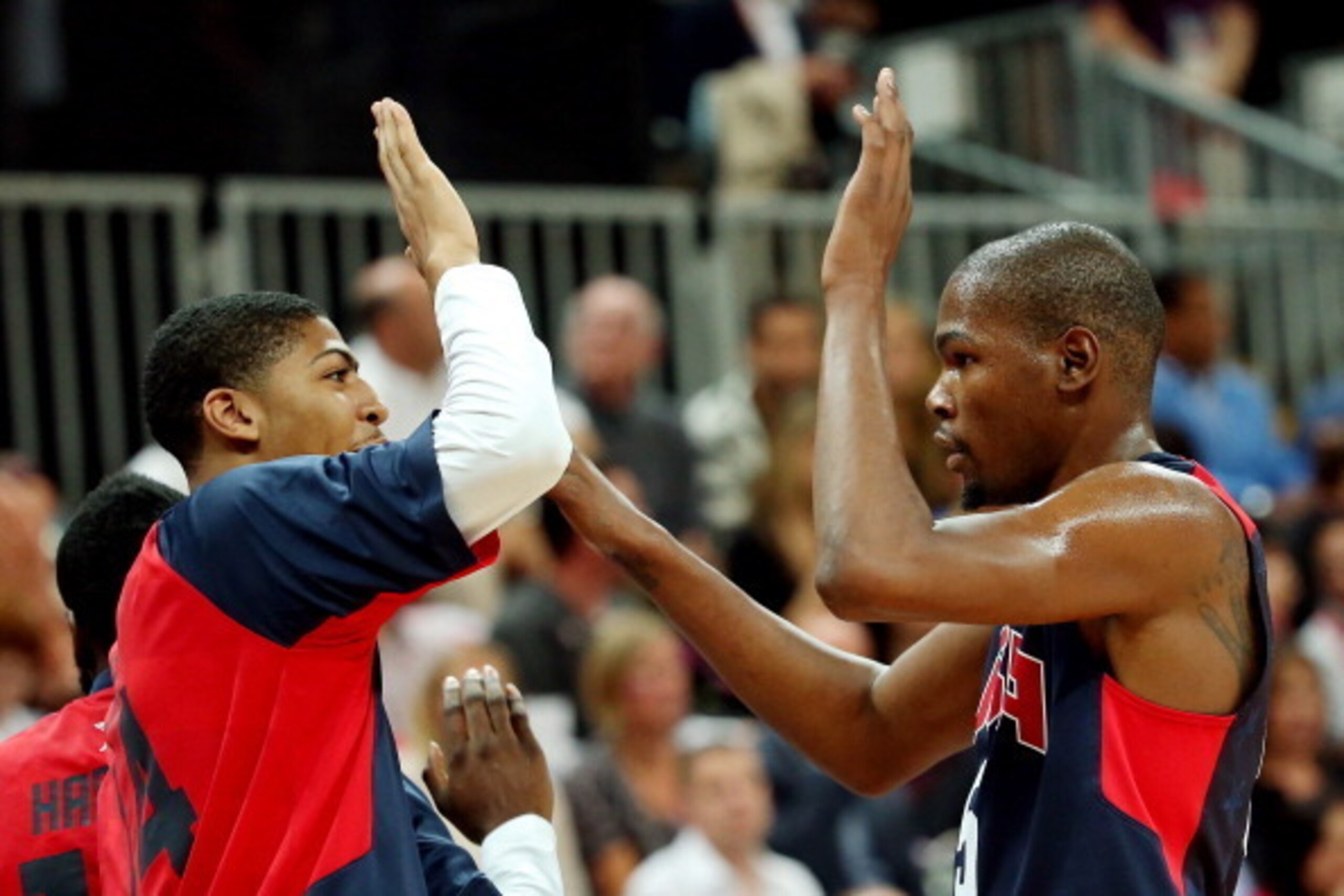 LONDON, ENGLAND - AUGUST 06:  Kevin Durant #5 of United States high five Anthony Davis #14 against Argentina during the Men's Basketball Preliminary Round match on Day 10 of the London 2012 Olympic Games at the Basketball Arena on August 6, 2012  in Londo