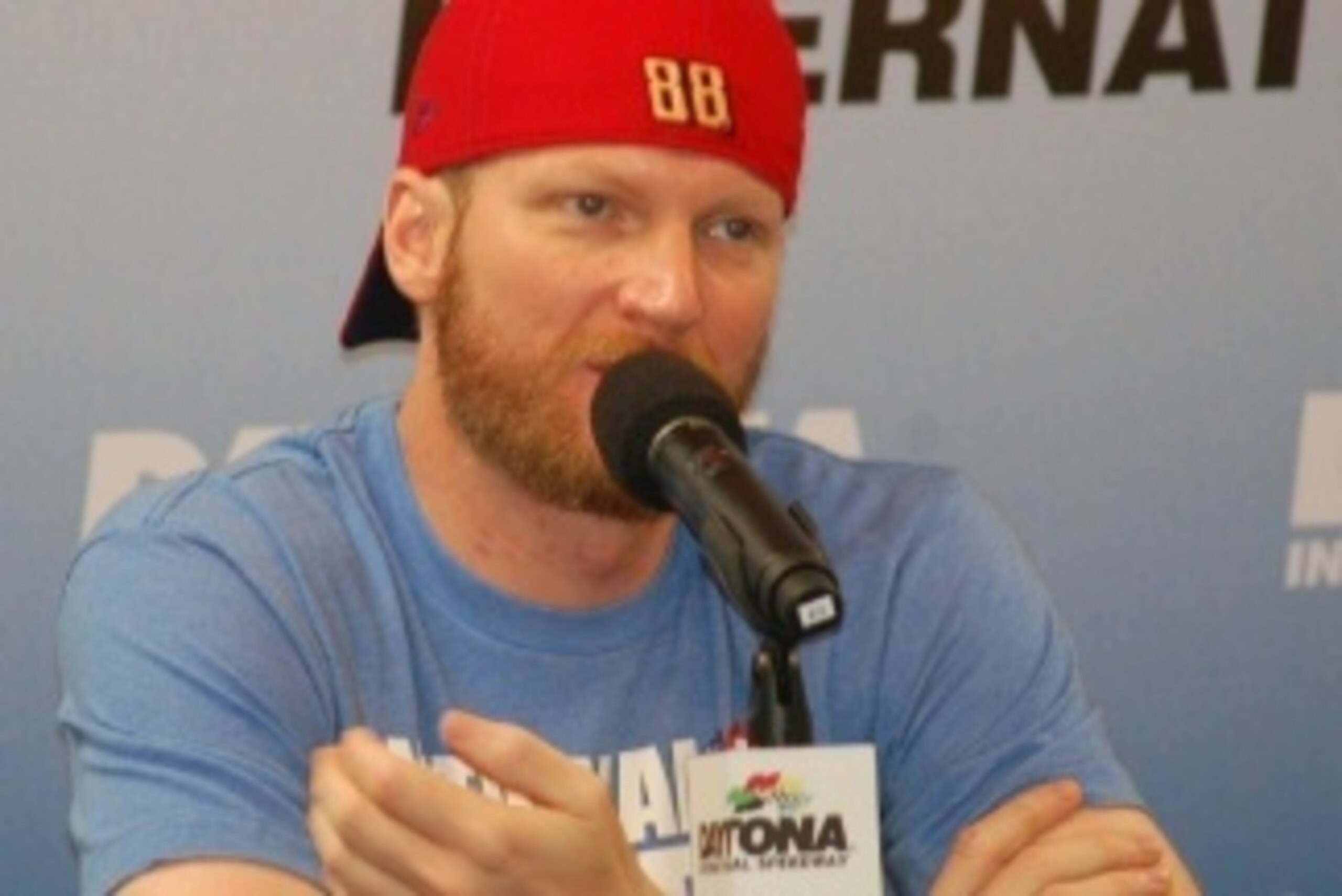 Dale Earnhardt Jr. makes a point to media at Daytona International Speedway.
