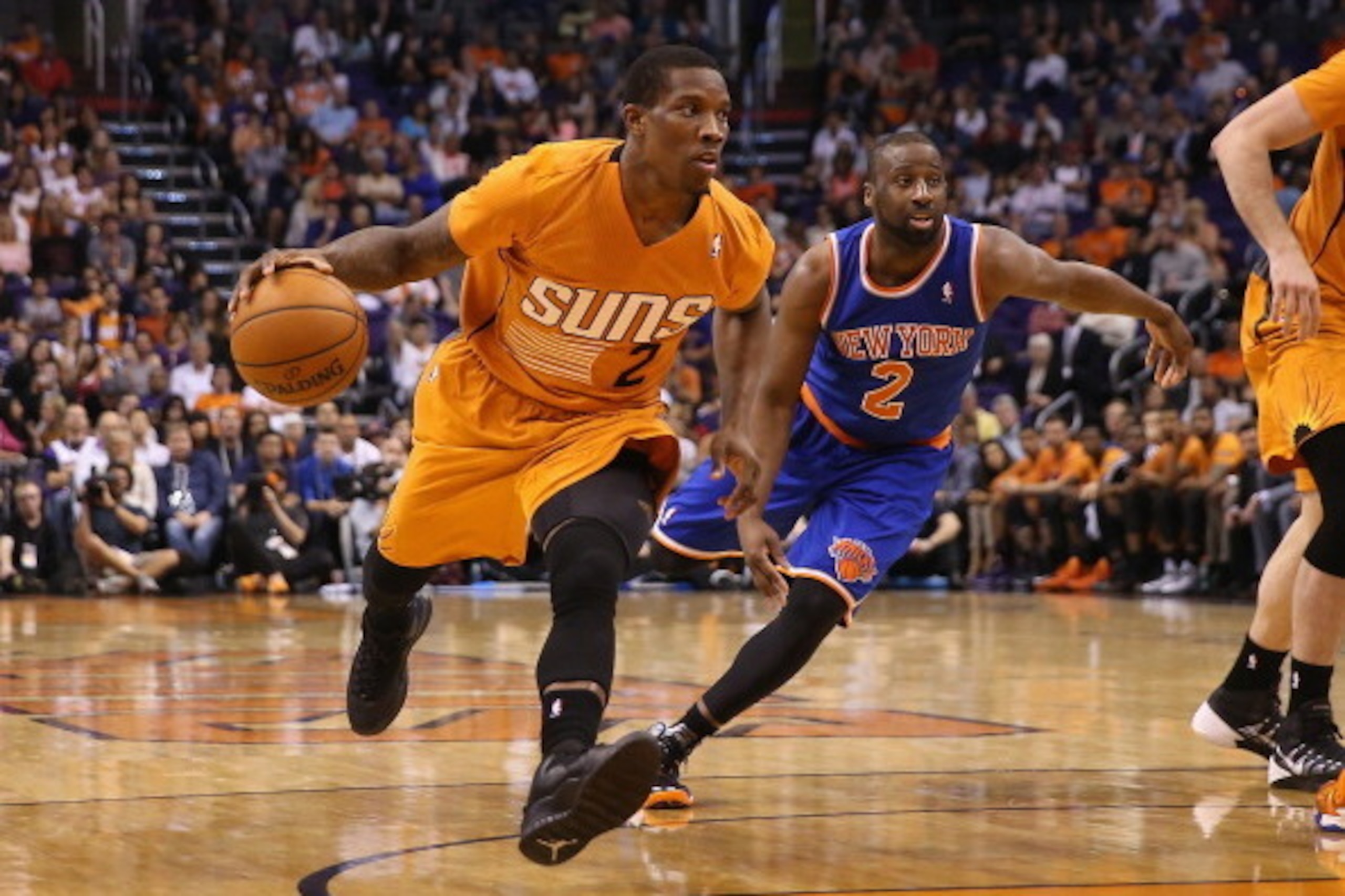 PHOENIX, AZ - MARCH 28:  Eric Bledsoe #2 of the Phoenix Suns handles the ball during the NBA game against the New York Knicks at US Airways Center on March 28, 2014 in Phoenix, Arizona. The Suns defeated the Knicks 112-88. NOTE TO USER: User expressly ack
