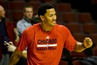 Feb 11, 2014; Chicago, IL, USA; Chicago Bulls point guard Derrick Rose (1) warms up before their game against the Atlanta Hawks at United Center. Mandatory Credit: Matt Marton-USA TODAY Sports