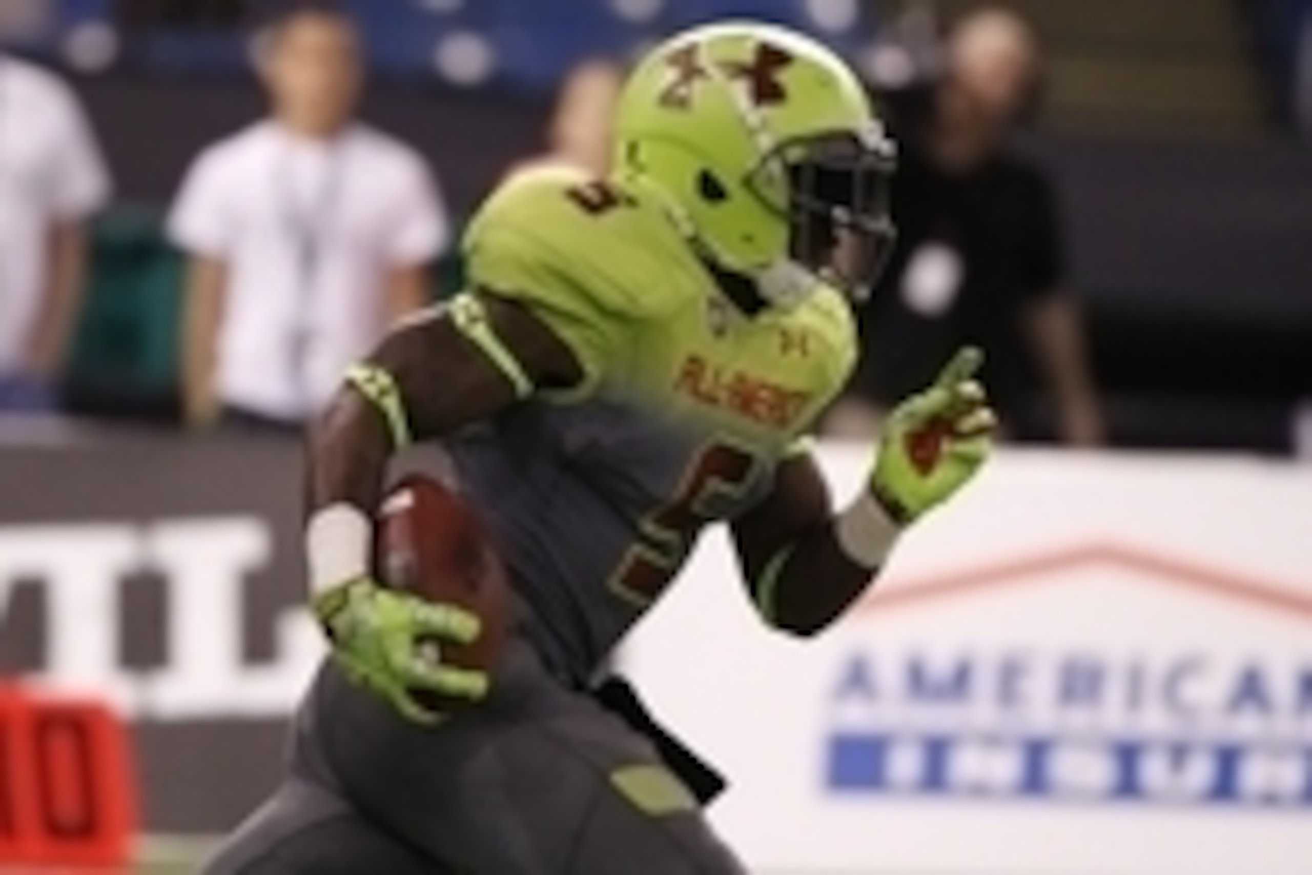 Jan 2, 2014; St. Petersburg, FL, USA; Team Nitro cornerback Jabrill Peppers (5) runs with the ball during a punt during the second half at Tropicana Field. Team Highlight defeated the Team Nitro 31-21. Mandatory Credit: Kim Klement-USA TODAY Sports