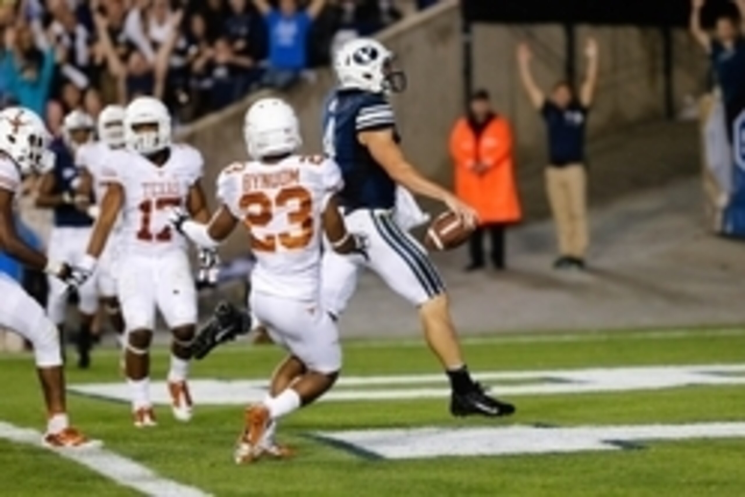 Sep 7, 2013; Provo, UT, USA; Brigham Young Cougars quarterback Taysom Hill (4) runs the ball into the end zone during the second quarter at Lavell Edwards Stadium. Mandatory Credit: Chris Nicoll-USA TODAY Sports