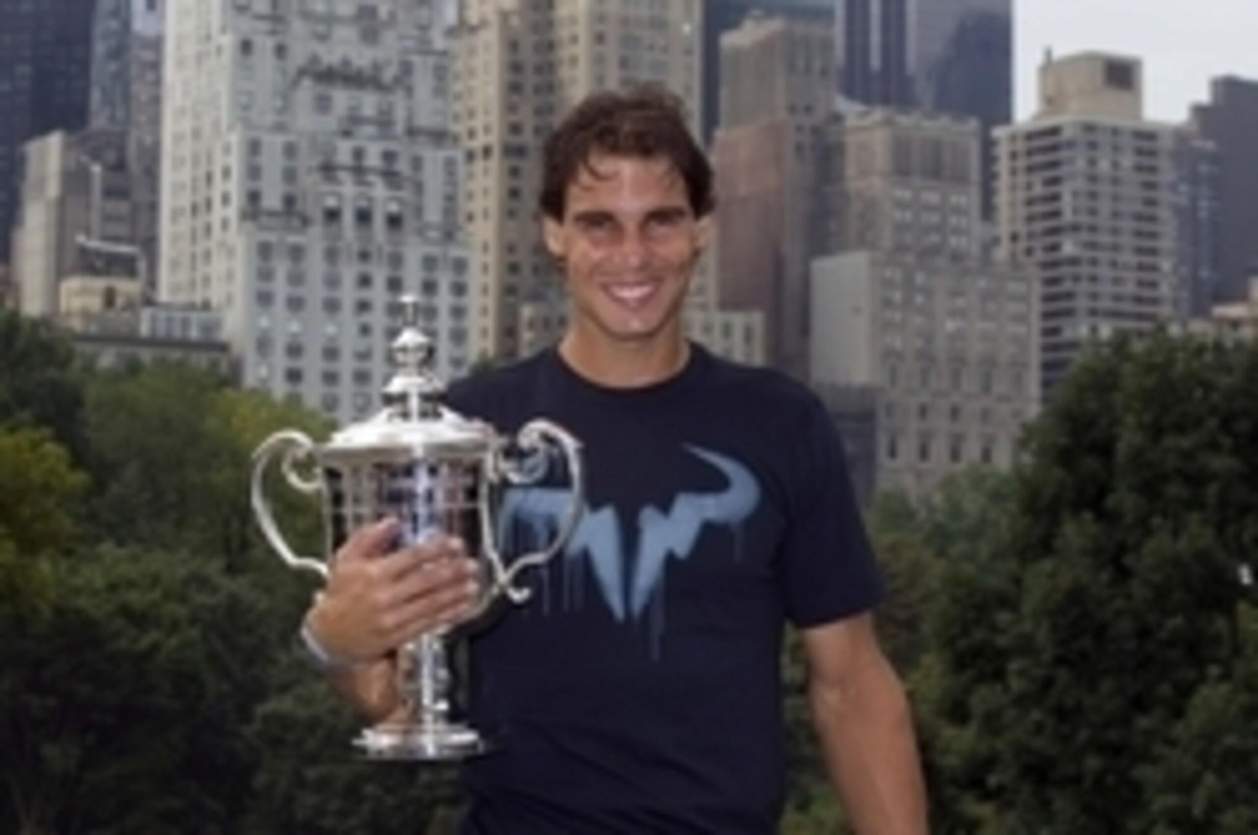 Sep 10, 2013; New York, NY, USA; Rafael Nadal (ESP) poses for a photo in Central Park the day after winning the 2013 US Open. Mandatory Credit: Susan Mullane-USA TODAY Sports