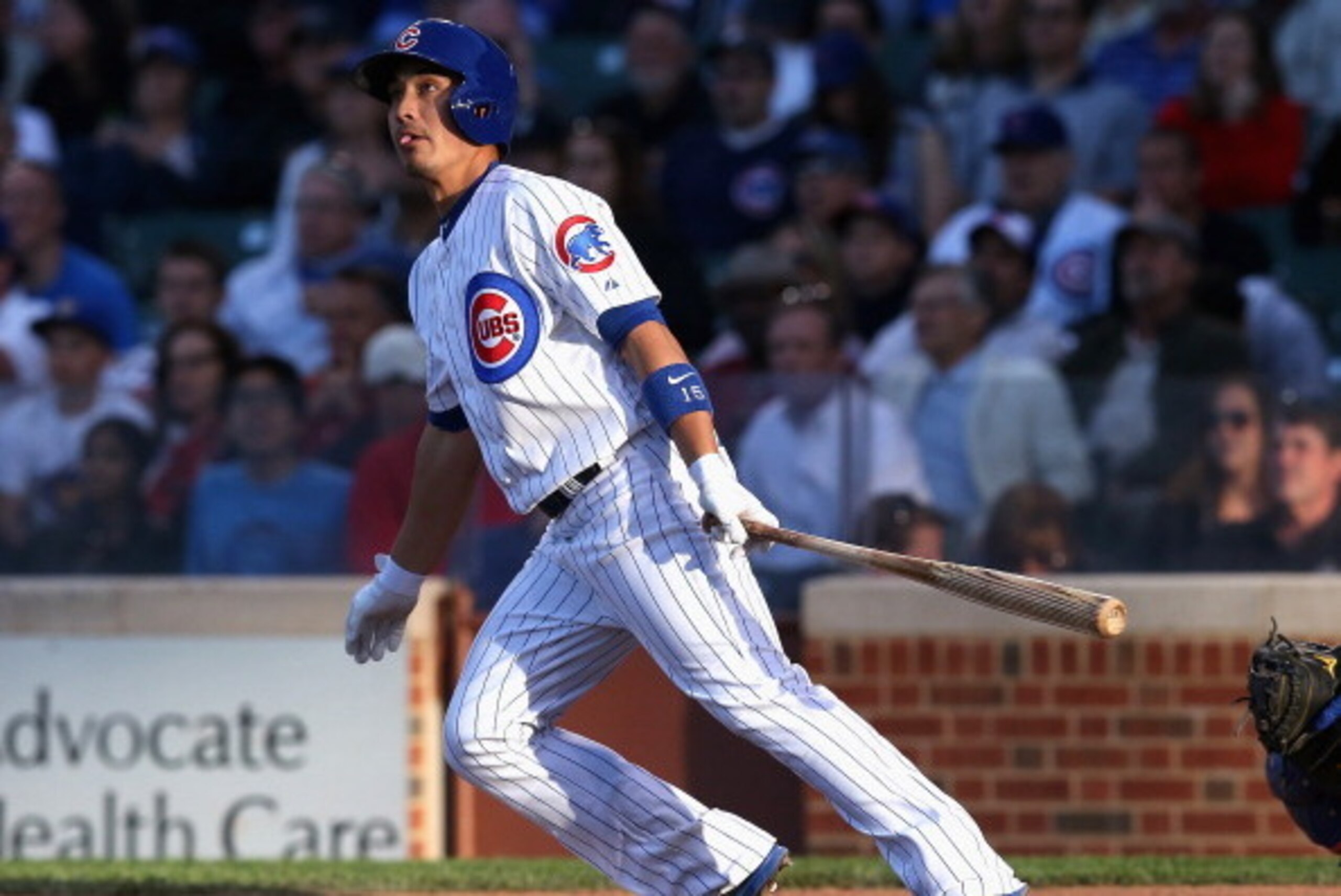 CHICAGO, IL - JUNE 05: Darwin Barney #15 of the Chicago Cubs hits a double in 4th inning against the New York Mets at Wrigley Field on June 5, 2014 in Chicago, Illinois. (Photo by Jonathan Daniel/Getty Images)