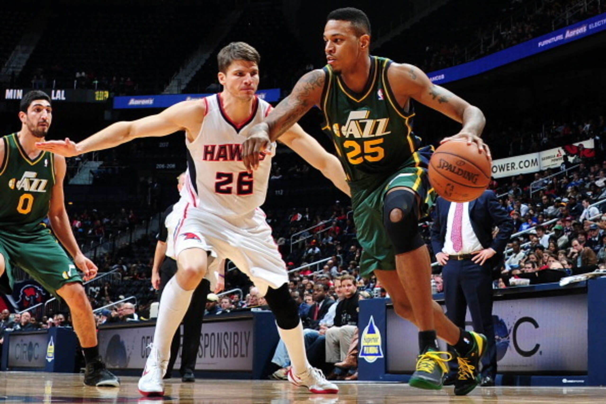 ATLANTA, GA - DECEMBER 20:  Brandon Rush #25 of the Utah Jazz drives to the basket against the Atlanta Hawks on December 20, 2013 at Philips Arena in Atlanta, Georgia.  NOTE TO USER: User expressly acknowledges and agrees that, by downloading and/or using