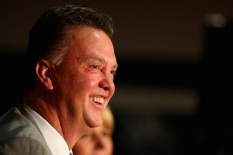 MANCHESTER, ENGLAND - JULY 17:  Louis van Gaal appears at a press conference as he is unveiled as the new Manchester United manager at Old Trafford on July 17, 2014 in Manchester, England.  (Photo by Clive Mason/Getty Images)