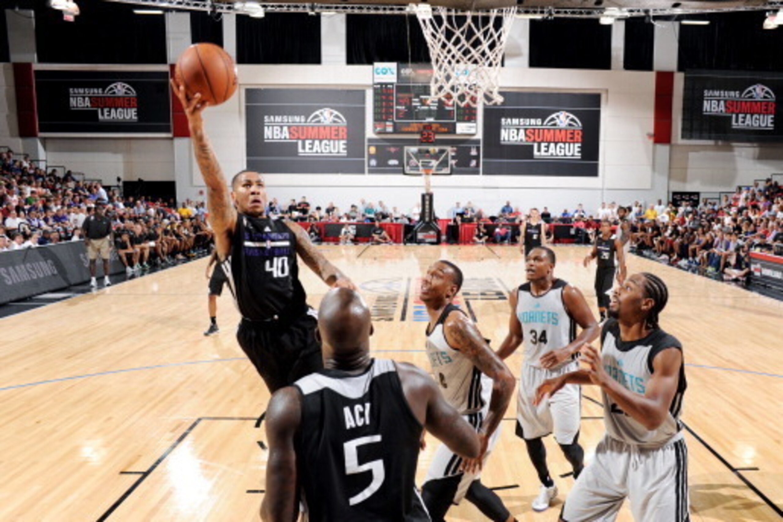 LAS VEGAS, NV - JULY 13: Eric Moreland #40 of the Sacramento Kings shoots against the Charlotte Hornets at the Samsung NBA Summer League 2014 on July 13, 2014 at the Cox Pavilion in Las Vegas, Nevada. NOTE TO USER: User expressly acknowledges and agrees t