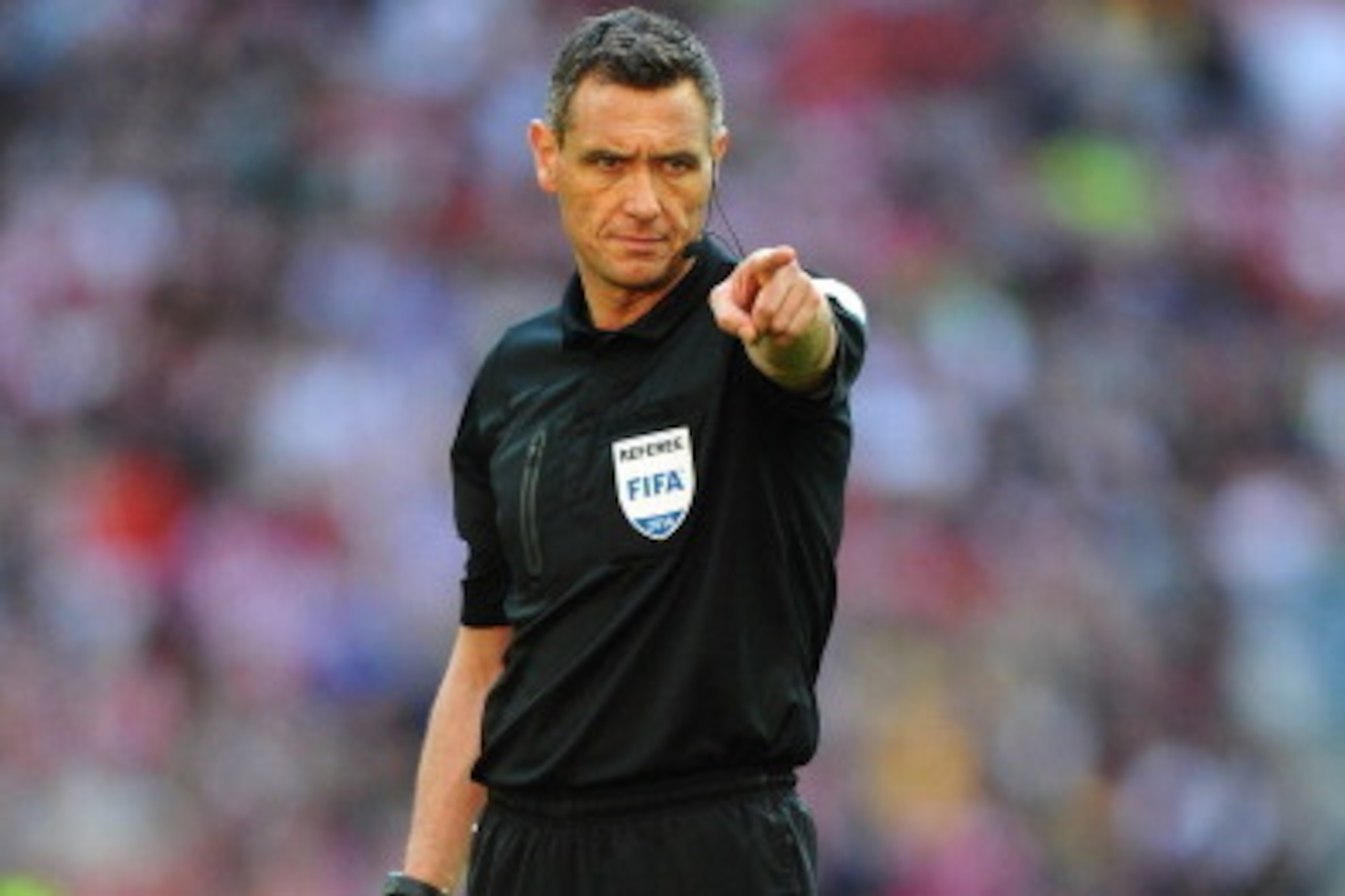 LONDON, ENGLAND - APRIL 13:  Referee Andre Marriner looks on during the FA Cup with Budweiser semi-final match between Hull City and Sheffield United at Wembley Stadium on April 13, 2014 in London, England.  (Photo by Mike Hewitt/Getty Images)