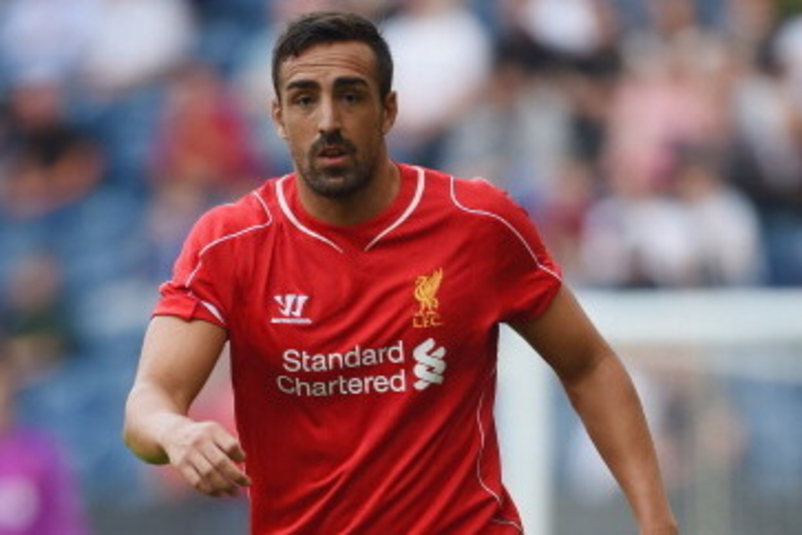 PRESTON, LANCASHIRE - JULY 19:  Jose Enrique of Liverpool in action during the pre season friendly match between Preston North End and Liverpool at Deepdale on July 19, 2014 in Preston, Lancashire.  (Photo by Michael Regan/Getty Images)