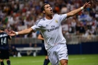 Aug 10, 2013; St. Louis, MO, USA; Real Madrid forward Cristiano Ronaldo (7) celebrates his goal against Inter Milan. Real Madrid defeated Inter Milan 3-0. Mandatory Credit: Scott Rovak-USA TODAY Sports