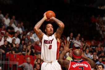 MIAMI, FL - March 10: Michael Beasley #8 of the Miami Heat shoots the ball against the Washington Wizards at the American Airlines Arena in Miami, Florida on March 10 2014. NOTE TO USER: User expressly acknowledges and agrees that, by downloading and/or u