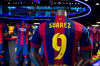 BARCELONA, SPAIN - JULY 12: A shirt of new FC Barcelona player Luis Suarez are seen on display at the FC Barcelona official store on July 12, 2014 in Barcelona, Spain.  (Photo by David Ramos/Getty Images)