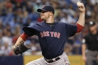 Jul 25, 2014; St. Petersburg, FL, USA; Boston Red Sox starting pitcher Jon Lester (31) throws a pitch during the second inning against the Tampa Bay Rays at Tropicana Field. Mandatory Credit: Kim Klement-USA TODAY Sports