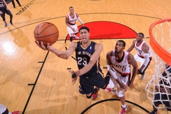 PORTLAND, OR - APRIL 6: Anthony Davis #23 of the New Orleans Pelicans shoots against the Portland Trail Blazers on April 6, 2014 at the Moda Center Arena in Portland, Oregon. NOTE TO USER: User expressly acknowledges and agrees that, by downloading and or