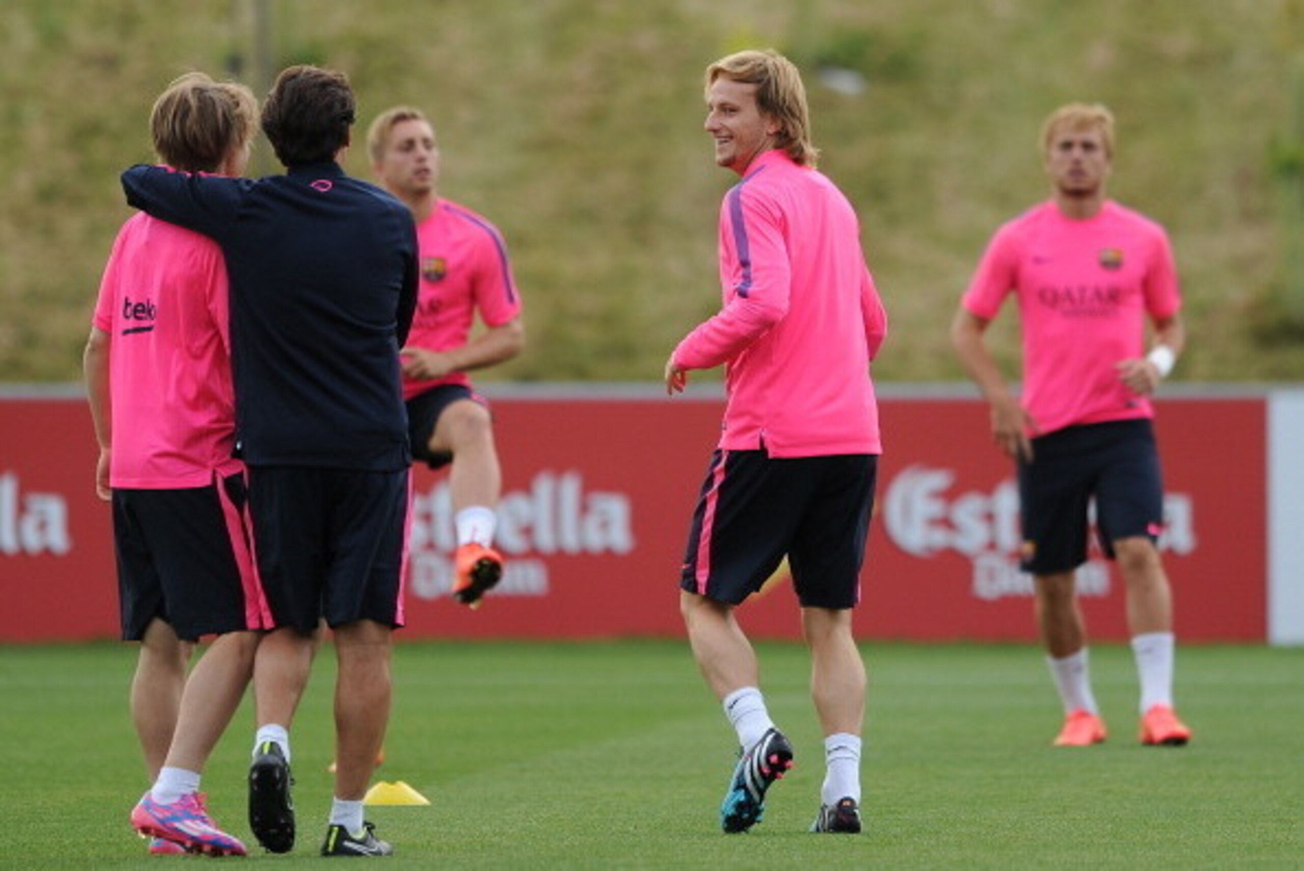 BURTON-UPON-TRENT, ENGLAND - JULY 28: Ivan Rakitic of Barcelona shares a laugh during the Barcelona Training Session at St George's Park on July 28, 2014 in Burton-upon-Trent, England. (Photo by Chris Brunskill/Getty Images)