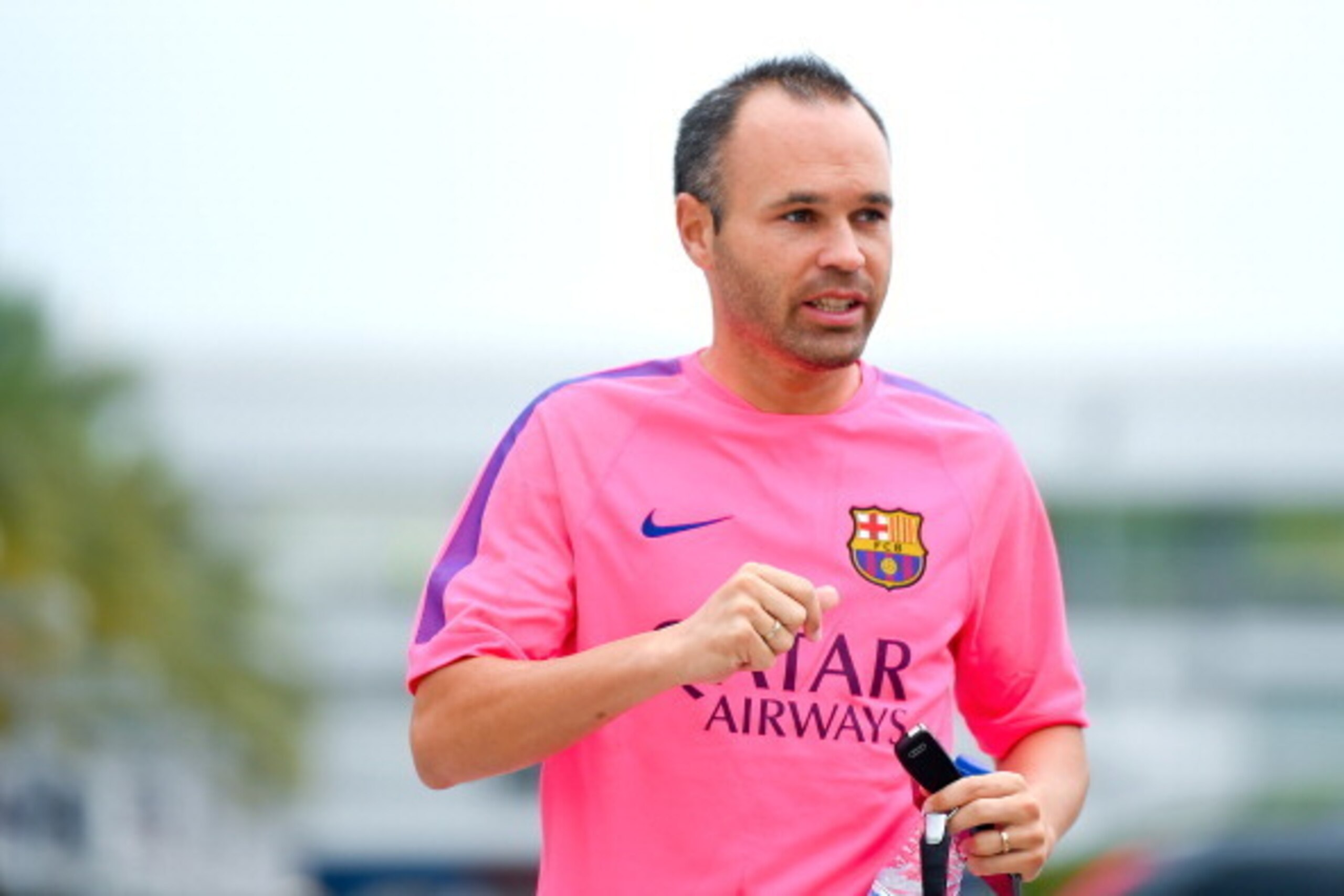 BARCELONA, SPAIN - JULY 25:  Andres Iniesta of FC Barcelona looks on after a FC Barcelona training session at Ciutat Esportiva de Sant Joan Despi on July 25, 2014 in Barcelona, Spain.  (Photo by David Ramos/Getty Images)