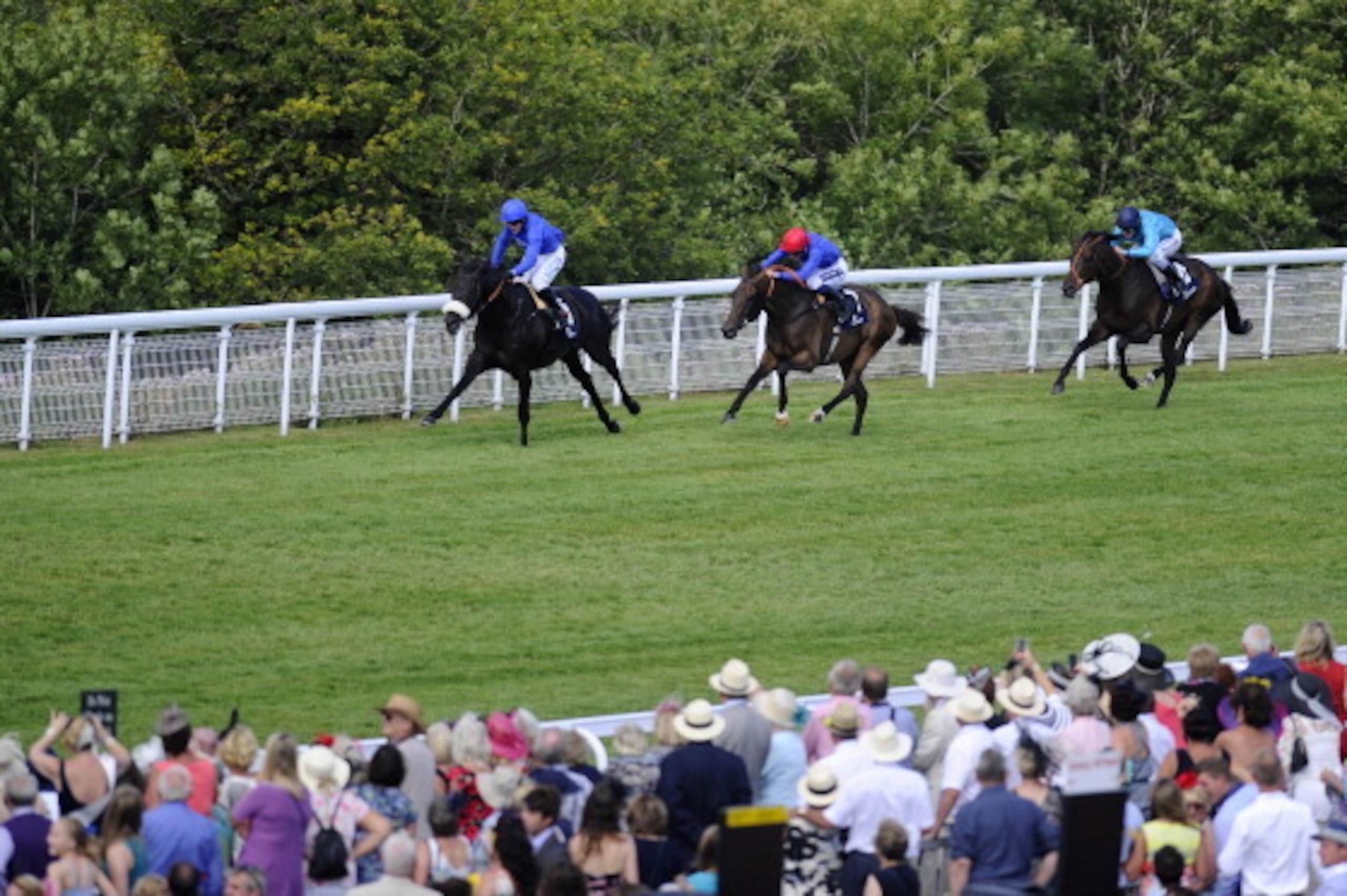 CHICHESTER, ENGLAND - JULY 31:  Kieren Fallon riding Cavalryman (L) win The Artemis Goodwood Cup from Ahzeemah and Harry Bently (C) at Goodwood racecourse on July 31, 2014 in Chichester, England. (Photo by Alan Crowhurst/Getty Images)