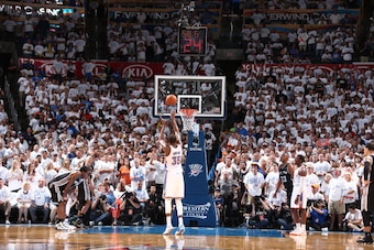 OKLAHOMA CITY, OK - May 31: Kevin Durant #35 of the Oklahoma City Thunder shoots a foul shot against the San Antonio Spurs in Game 6 of the Western Conference Finals during the 2014 NBA Playoffs at the Chesapeake Arena on May 31, 2014 in Oklahoma City, Ok