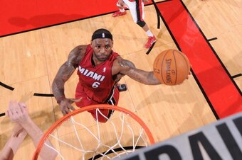 PORTLAND, OR - JANUARY 9:  LeBron James #6 of the Miami Heat drives to the basket during a game against the Portland Trail Blazers on January 9, 2011 at the Rose Garden Arena in Portland, Oregon.   NOTE TO USER: User expressly acknowledges and agrees that