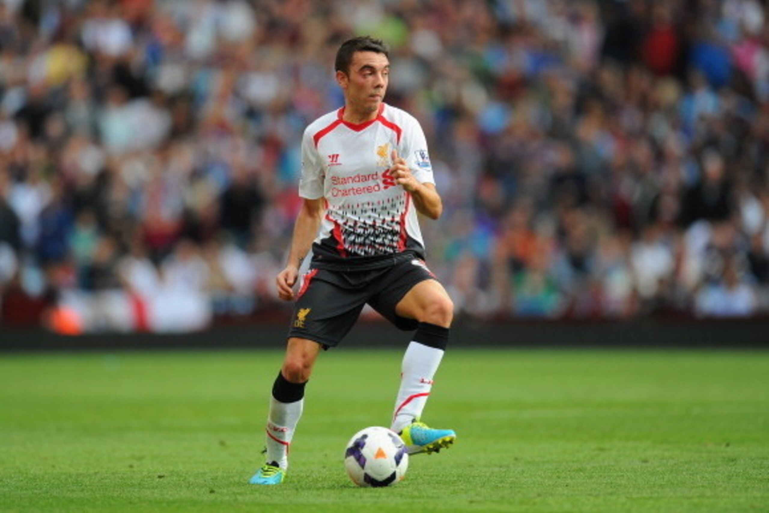 BIRMINGHAM, ENGLAND - AUGUST 24: Liverpool player Iago Aspas in action during the Barclays Premier League match between Aston Villa and Liverpool at Villa Park on August 24, 2013 in Birmingham, England. (Photo by Stu Forster/Getty Images) BIRMINGHAM, ENGLAND - AUGUST 24: Liverpool player Iago Aspas in action during the Barclays Premier League match between Aston Villa and Liverpool at Villa Park on August 24, 2013 in Birmingham, England. (Photo by Stu Forster/Getty Images)