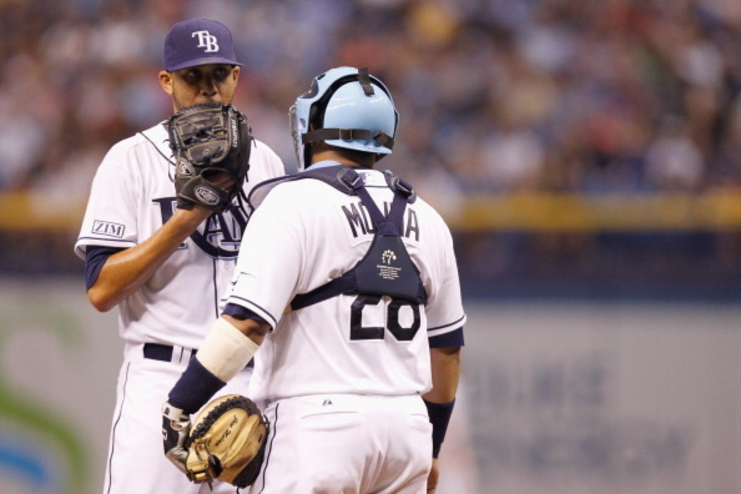 ST PETERSBURG, FL - JULY 25:  Jose Molina #28 of the Tampa Bay Rays comes to the mound to talk to David Price #14 of the Tampa Bay Rays during the sixth inning against the Boston Red Sox at Tropicana Field on July 25, 2014 in St Petersburg, Florida.  (Pho