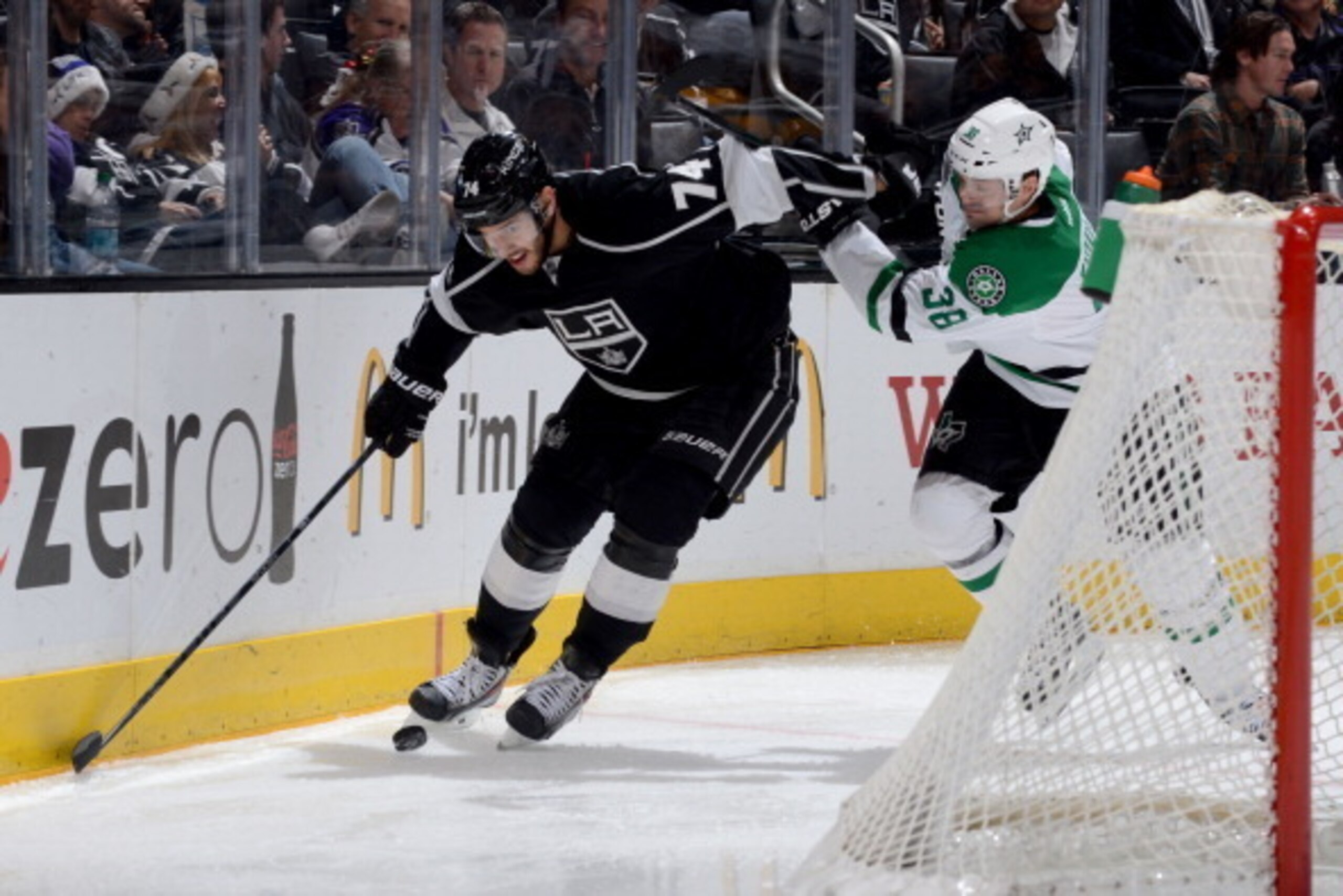 LOS ANGELES, CA - DECEMBER 23: Dwight King #74 of the Los Angeles Kings skates with the puck against Vernon Fiddler #38 of the Dallas Stars at Staples Center on December 23, 2013 in Los Angeles, California. (Photo by Noah Graham/NHLI via Getty Images) LOS ANGELES, CA - DECEMBER 23: Dwight King #74 of the Los Angeles Kings skates with the puck against Vernon Fiddler #38 of the Dallas Stars at Staples Center on December 23, 2013 in Los Angeles, California. (Photo by Noah Graham/NHLI via Getty Images)