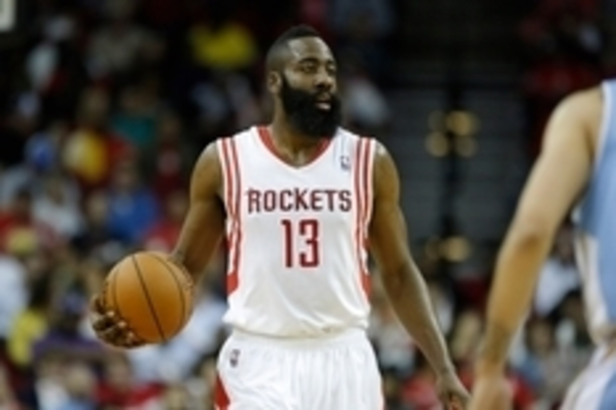 Apr 6, 2014; Houston, TX, USA; Houston Rockets guard James Harden (13) brings up the ball during the first quarter against the Denver Nuggets at Toyota Center. Mandatory Credit: Andrew Richardson-USA TODAY Sports