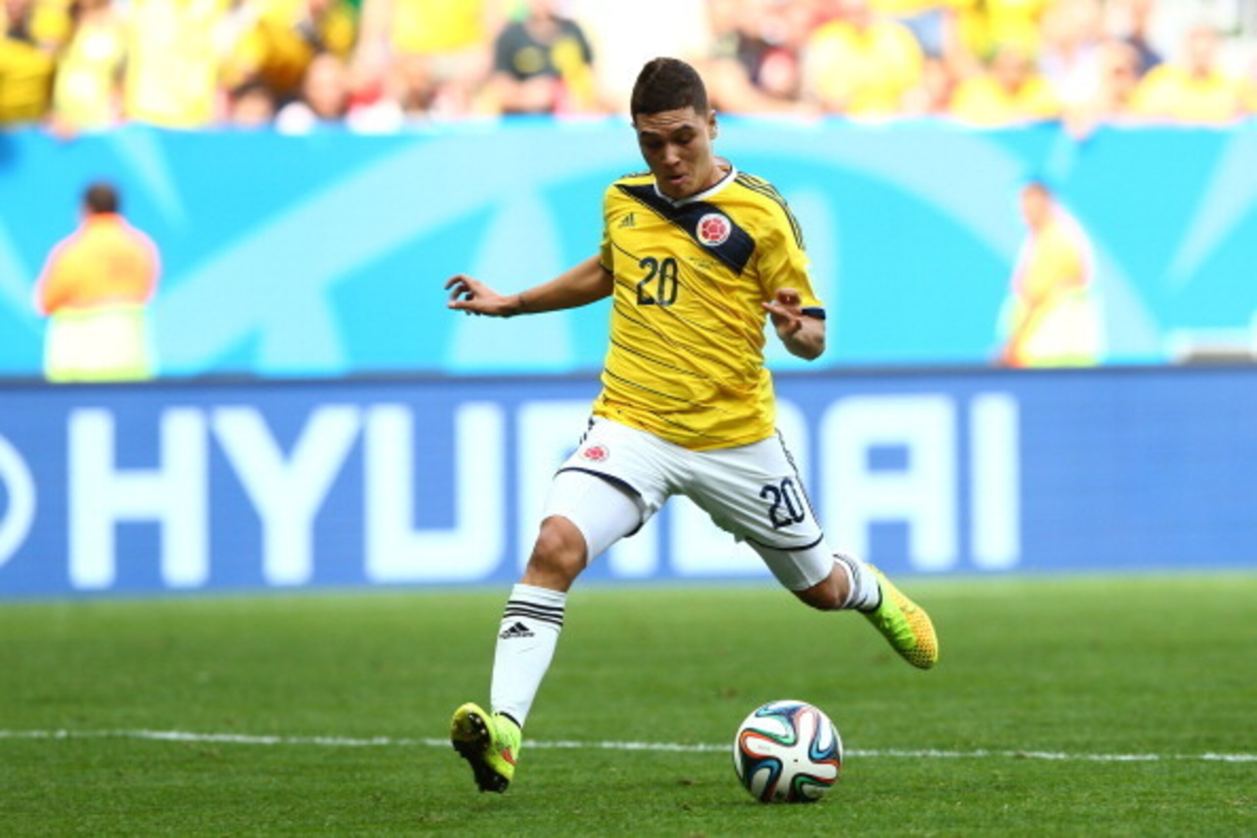 BRASILIA, BRAZIL - JUNE 19:  Juan Fernando Quintero of Colombia scores his team's second goal during the 2014 FIFA World Cup Brazil Group C match between Colombia and Cote D'Ivoire at Estadio Nacional on June 19, 2014 in Brasilia, Brazil.  (Photo by Elsa/