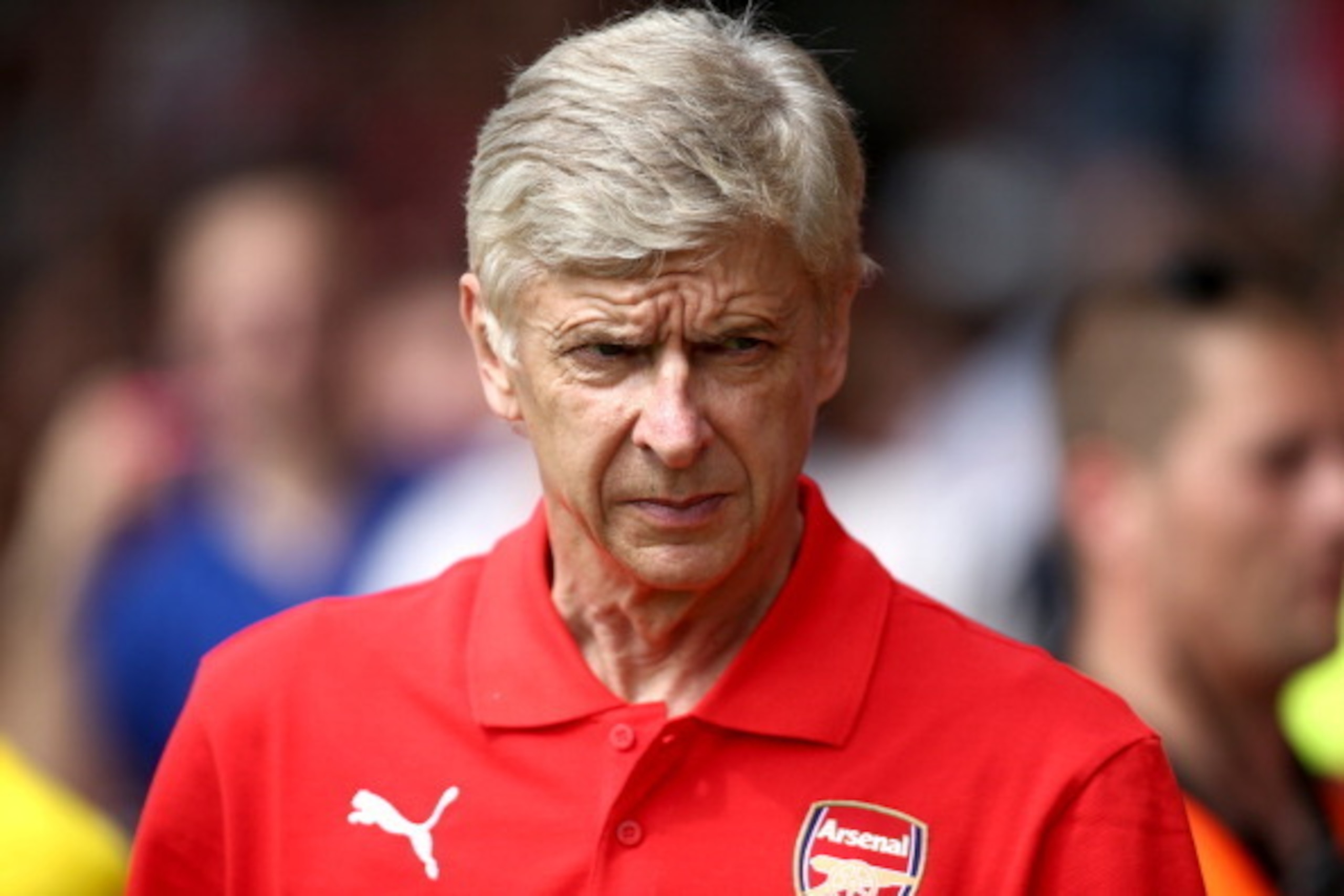 BOREHAMWOOD, ENGLAND - JULY 19:  Arsenal manager Arsene Wenger looks on during the pre season friendly match between Borehamwood and Arsenal at Meadow Park on July 19, 2014 in Borehamwood, England.  (Photo by Jordan Mansfield/Getty Images)